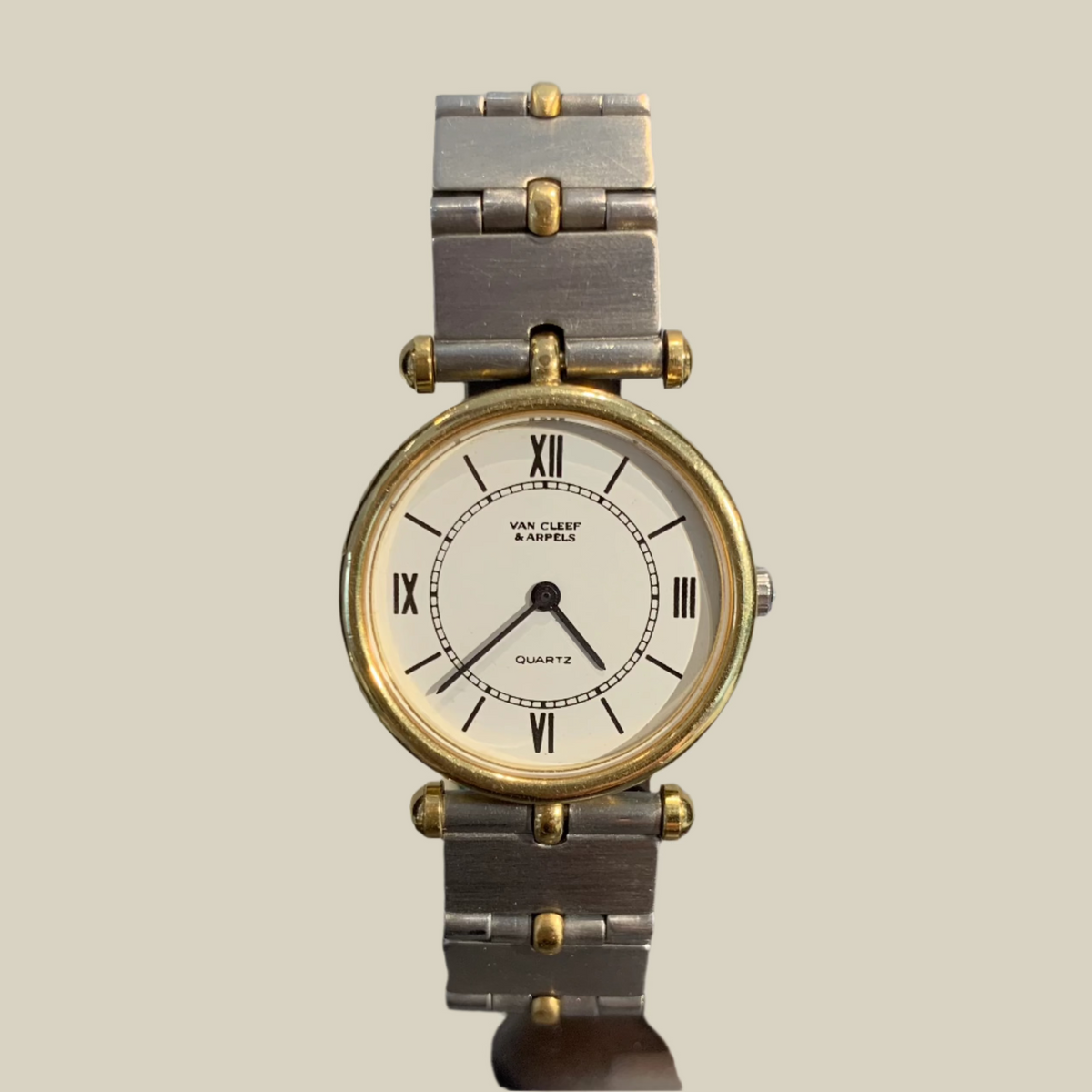 Van Cleef & Arpels 24mmm Yellow Gold And stainless steal watch.