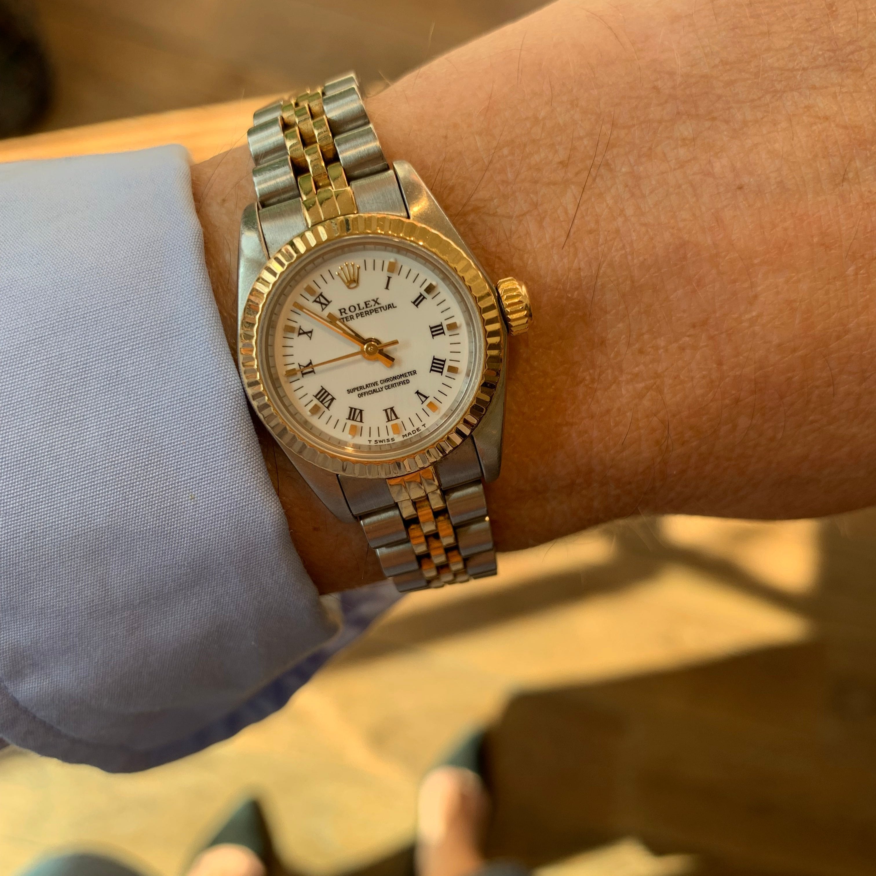 Rolex Oyster Perpetual 24mm with White Dial Preowned Rolex Swiss Watch Club