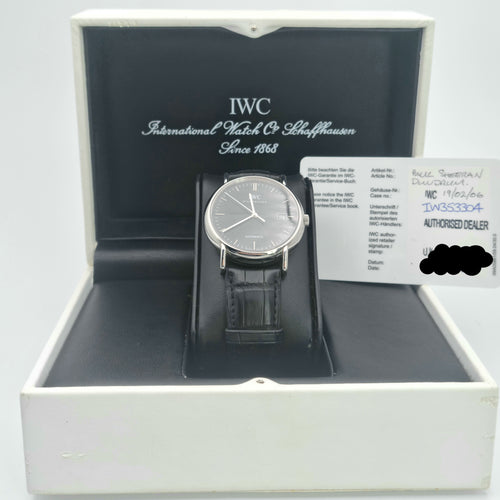  IWC Schaffhausen Portofino Automatic IW353304 with steel case, black dial with no numerals and a leather bracelet sold in Swiss Watch Club store.