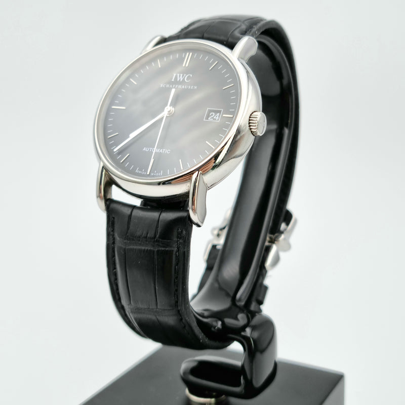 IWC Schaffhausen Portofino Automatic IW353304 with steel case, black dial with no numerals and a leather bracelet sold in Swiss Watch Club store.